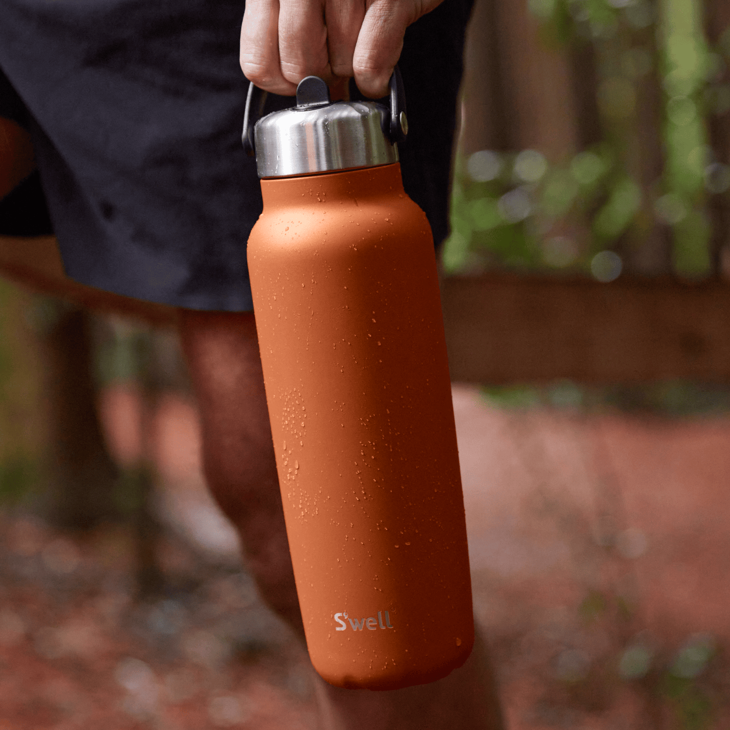 explorer-with-flip-straw-lid-40oz-m1 Swell-Explorer-Water-Bottle-40oz-Orange-Carnelian-LifeStyle.png