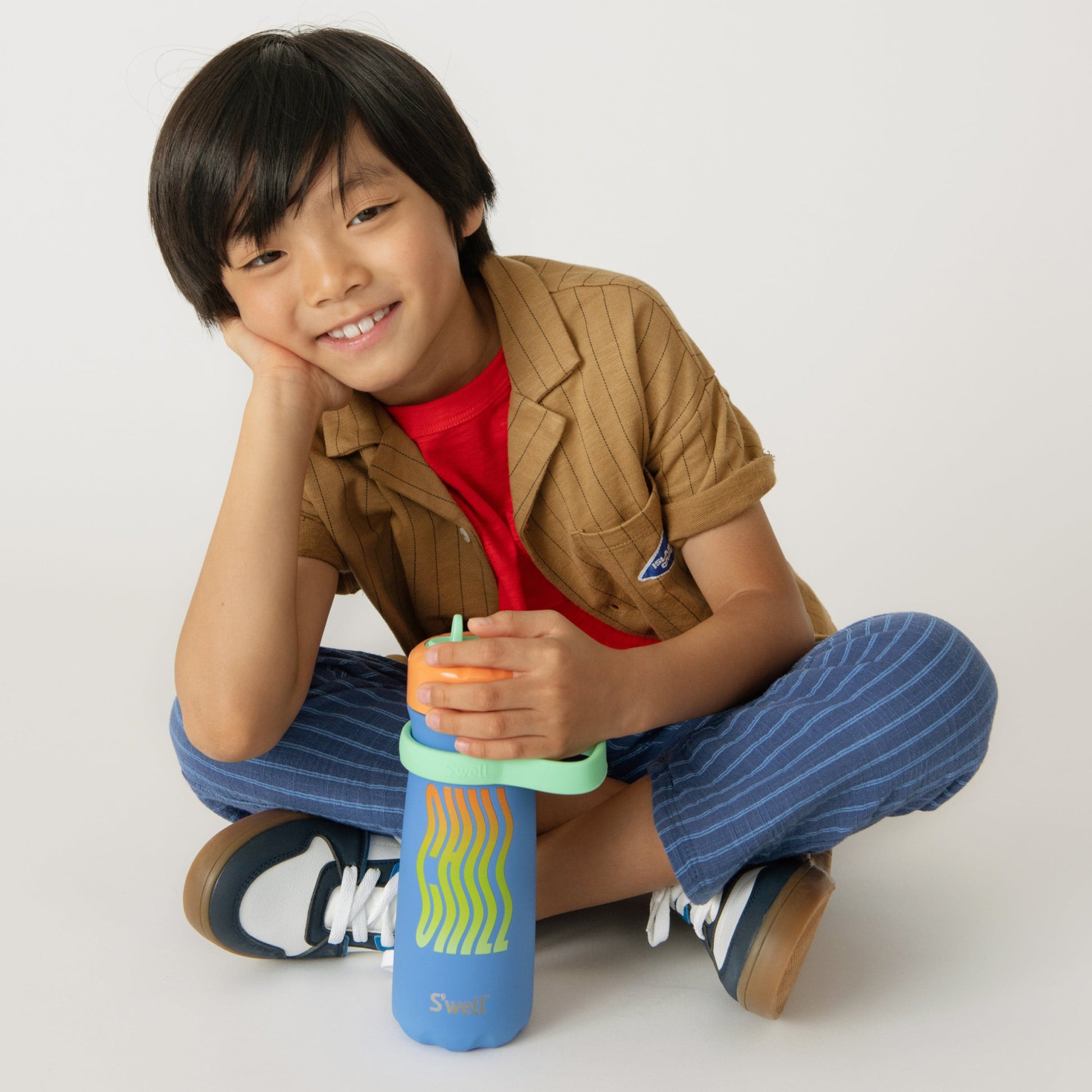 traveler-with-flip-straw-lid-16oz-r7 Swell-Kids-Water-Bottle-Traveler-16oz-Blue-Chill-Lifestyle.jpg